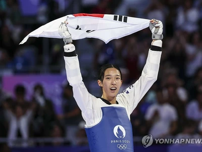 태권도 김유진, 16년 만의 57㎏급 우승…한국, 대회 13호 금메달