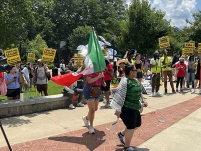 주말 로렌스빌서 이민단속 항의 시위