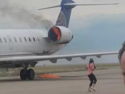항공기 착륙후 엔진서 불...63명 '아찔한 대피'