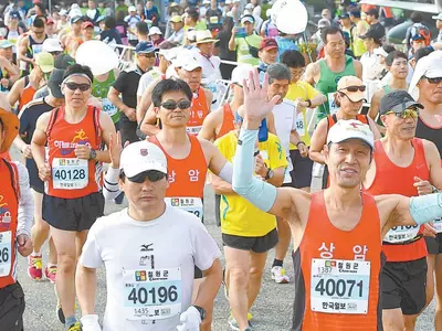 초보 마라토너, 부상 피하려면 출발 전 워밍업을