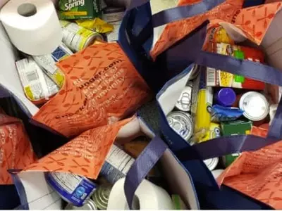 둘루스 코옵, 식료품 무료 제공