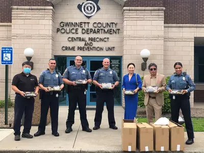 〈사진〉안보협 등 귀넷경찰서에 도시락 전달