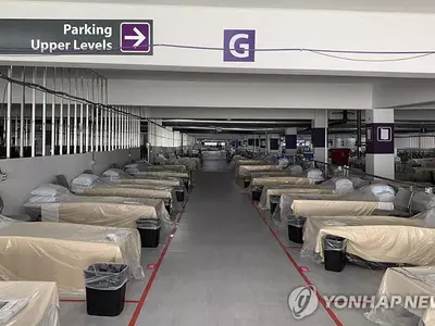 미 코로나 폭증에 주차장까지 병실로…"의료진, 뼛속까지 피곤"