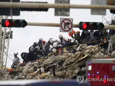 아파트 붕괴 사망자 12명으로 늘어…실종자 149명