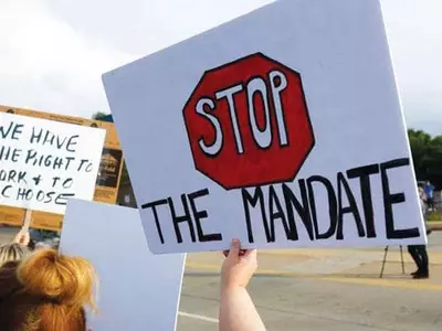 “백신 접종 강요하면 직장 그만두겠다”