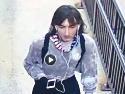 시카고 총격범 여장 도주