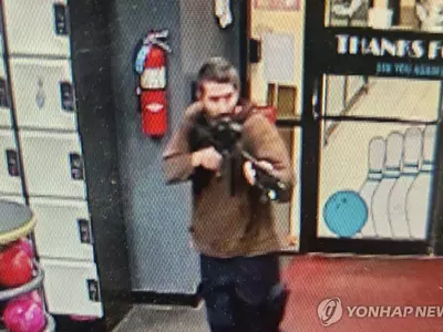 메인주 총기난사 사망 18명·부상 13명…용의자 추적중
