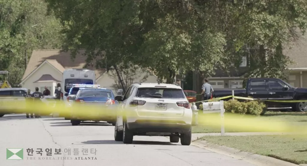 8일 오전 귀넷 경찰이 총격사건이 발생한 주택 주변을 통제하고 있다.<사진=귀넷 경찰 제공>