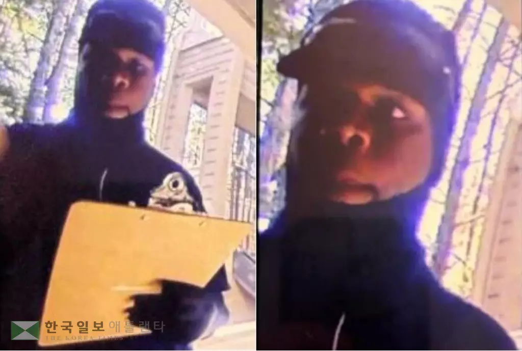 귀넷 셰리프국 직원을 사칭하며 배심원 불출석을 이유로 체포 협박을 한 뒤 현금을 받으러 온 사기범이 피해자 집 현관 감시 카메라에 찍힌 모습.<사진=스와니 경찰 제공>