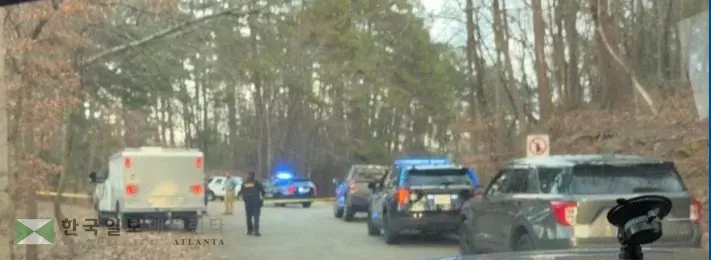 21일 오후 홀 카운티 셰리프국 요원들이 사건 현장을 통제하고 있다.<사진=홀 카운티 셰리프국 제공>