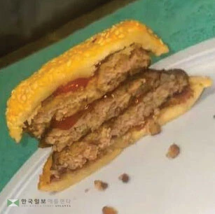 영국의 한 수감자가 틱톡에 게재한드론 배달 햄버거 영상. <틱톡 캡처>